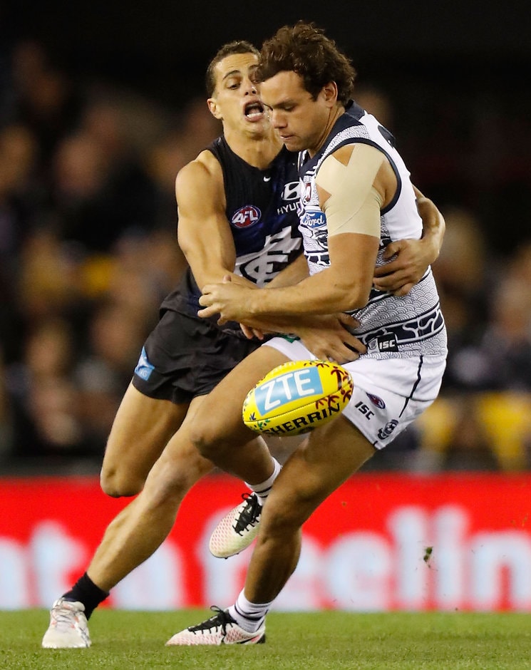 AFL 2016 Rd 10 - Carlton v Geelong MELBOURNE, AUSTRALIA - MAY 29: Steven Motlop of the Cats an Ed Curnow of the Blues compete for the ball during the 2016 AFL Round 10 match between the Carlton Blues and the Geelong Cats at Etihad Stadium on May 29, 2016 in Melbourne, Australia. (Photo by Michael Willson/AFL Media)